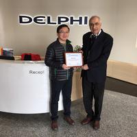 Dr. George Ayoub accepts the Delphi China Appreciation Award