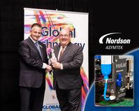 Joe Stockunas, vice president, Advanced Technology, Nordson Corporation, accepts award.