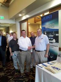 At the Michigan SMTA Seminar and Vendor Show held at Oak Pointe Country Club in Brighton, MI on May 19, 2011. From Right: Bob Watters, Juki Regional Manager; Frank Garcia, SMT Engineer; Mike Glass, Vice President of Operations; and Travis Wilson, Process Engineer.