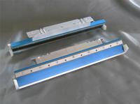 Pictured is a pair of Universal Permalex holder and blade assemblies for Ekra Serio Users.