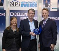 L to R: Kester's Marketing & Communications Specialist, Michelle O'Brien, and Technical Manager, Denis Jean, accept their NPI award from Circuit Assembly’s Mike Buetow.